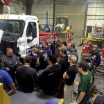 ... Trooper Cory Beaver brings student up-to-date on prevailing motor carrier regulations.