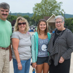 President Davie Jane Gilmour greets nursing student Lauren D. Bitting, of Lewistown, and her parents, Jeffrey and Cathy, during Welcome Weekend 2014.
