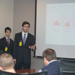 In a GE conference room, the students describe their proposed redesign.