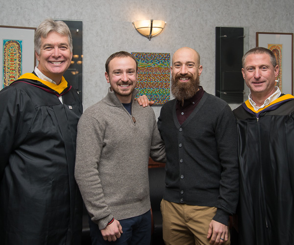 Brothers and their mentors! Matthew L. Gross (second from left), ’06, plastics and polymer technology, and Jason C. Gross, ’05, plastics and polymer engineering technology, enjoy pre-commencement conversation with their former professors Timothy E. Weston (far left) and Kirk M. Cantor. 