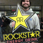 Displaying his newly won Rockstar sign is Matthew S. Nauman, an electronics and computer engineering technology major from Ulysses. (Jonathon M. Conway, a diesel technology student from Durham, Conn., took home an Apple TV.)