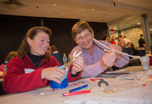 Debra Lindner and David Lentz, technology teachers at Sullivan County High School, assemble a rubber-band powered glider as they practice hands-on lessons they can use in their classes to help students practice creative problem-solving and prepare them for potential careers in science, technology, engineering and math fields. The free STEM curriculum was developed and demonstrated by the National Integrated Cyber Education Research Center; a workshop on the curriculum was offered at Penn College by the college and BLaST Intermediate Unit 17.