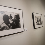 “Boy Scouts at their Weekly Meeting, Muslim American Society, Brooklyn, NY" (foreground) is among the gelatin silver prints on display.