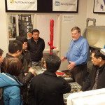 Visitors from China listen to Daniel R. Mendell, ShaleNET U.S. consultant/instructor ...