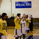 Sporting T-shirts proclaiming, "I've got your back," the motto of the Aevidum suicide-prevention organization, the Wildcat men's team lines up at pregame.