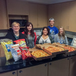 Students, from left, Lloyd A. Shope, of Blanchard; Keegan D. Sonney, of Erie; Natascha G. Santaella, of Guaynabo, Puerto Rico; Nathan Diaz, of Reading;  Merissa N. Aucker, of Middleburg; and Alexis L. Kepley, of Reading, gather with an enviable spread of goodies for their movie night.