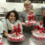 Valentine goodies are deliciously prepared and beautifully packaged by baking and pastry arts majors (from left) Ally T. Monborne; Natascha G. Santaella, of Puerto Rico; Lloyd A. Shope, of Blanchard; and Sarah I. Tielmann.