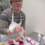 Lloyd A. Shope confidently wields a pastry bag.
