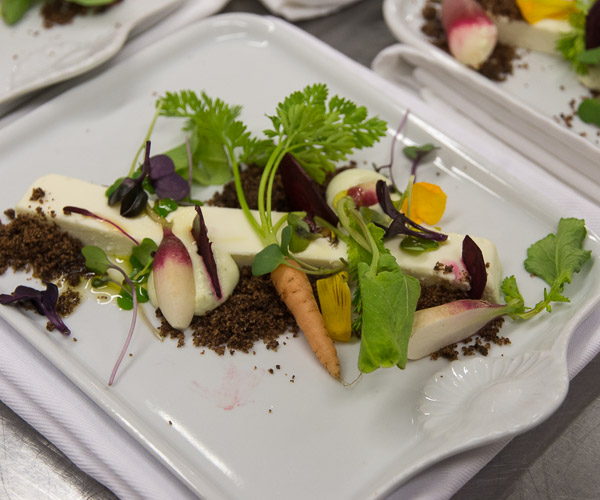 A garden on a plate: lemon goat-cheese panna cotta with tiny garden vegetables, romaine crème fraiche and cardamom 