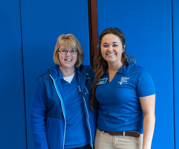Robin S. Enderle (left), secretary to the chief student affairs officer, and Ambassador Katelyn A. Wertz are among the day's friendly faces.