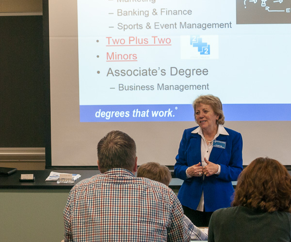 Gerri F. Luke, dean of business and hospitality, offers an overview of the majors within her purview, a scene repeated in the college's five other academic schools.
