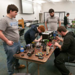 Assembled in College Avenue Labs are (foreground, from left) Matthew A. Semmel, of Palmerton, engineering design technology; Kaylee R. Tressler, of Howard, electronics and computer engineering technology; Brandon T. Russell, of Nottingham, engineering design technology; and Timothy R. Thompson, Stephens City, Va., electronics and computer engineering technology. At rear is Michael E. Zalatan, an information technology: network specialist concentration major from Center Valley.