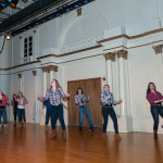 A country line has some fun with Luke Bryan's "Kick the Dust Up."