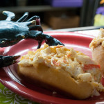 A prop crab sidles toward a dish that looks uncomfortably familiar.