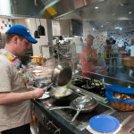 Jonathan T. Hall, an assistant cook at Dauphin Hall, prepares stir-fry ...