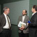 Prior to the lecture, Bass converses with Mark D. Noe (left) professor of English-composition, and Brad L. Nason, associate professor of mass communications. 
