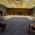 Panelists fill the front of the Thompson Professional Development Center's Mountain Laurel Room.