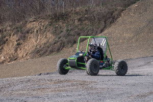 Nathan M. Eckstein, a manufacturing engineering technology major from Cambridge Springs, practices driving the Penn College car that will compete in Baja SAE Tennessee Tech.