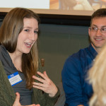 Students from a variety of health sciences professions sit alongside one another to discuss their perspective and role in a patient case.