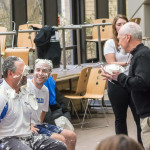 Tom A. Zimmerman, associate professor of psychology and faculty athletics representative, connects on a line drive to Howard.