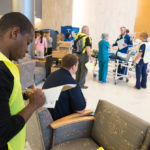 Shakeem S. Thomas, of Brooklyn, N.Y., jots down his impressions inside Williamsport Regional Medical Center.