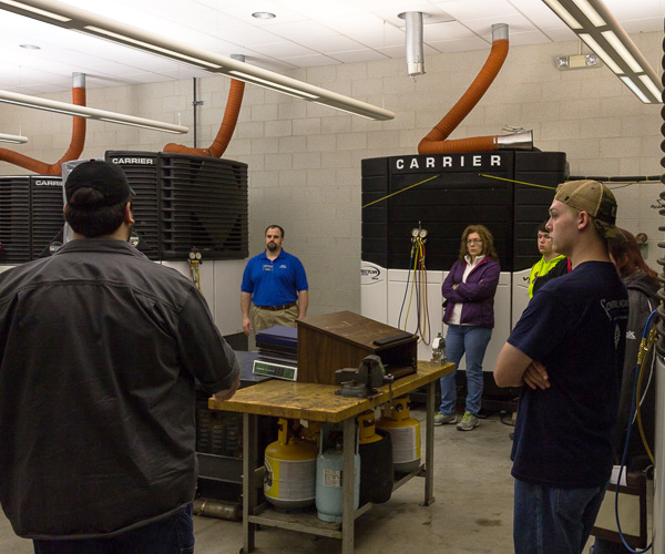 Faculty member Brad R. Conklin provides a tour of the refrigeration lab.