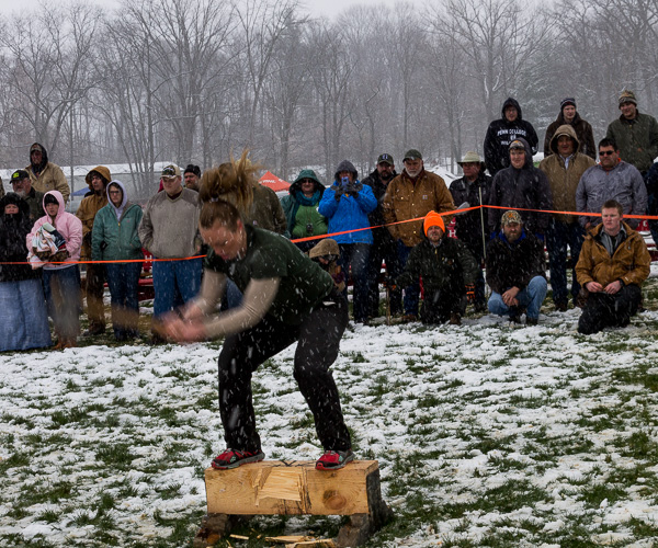 The blur of heavy, wet snowflakes doesn't dull the focus of this competitor in the Women's Horizontal Speed Chop.