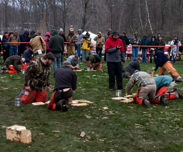 An official keeps time for Water Boil contestants.
