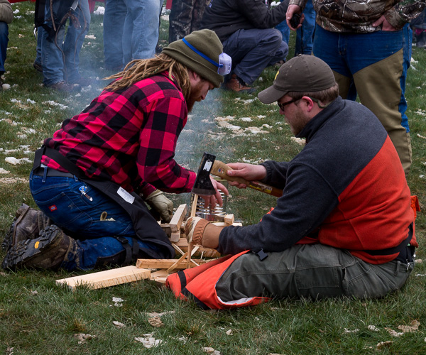 Penn College's Noah L. English (left), of Bloomsburg, and Paul M. George, of State College, build a fire on their way to a first-place finish in the Water Boil.