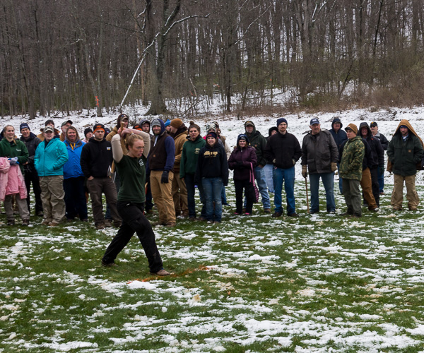 An entrant in the Axe Throw prepares to let loose her attempt.