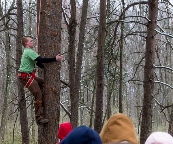 Penn College's Anthony A. Hampton, of Clearfield, takes part in the Pole Climb event ...