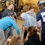 Adorned with their alma mater, Penn Staters work to beat the clock.