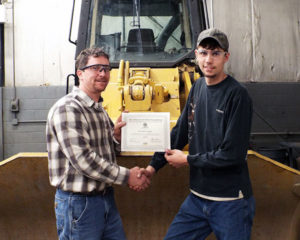 Penn College diesel equipment technology instructor Chris S. Weaver (left) presents a $1,000 tool scholarship to Ronald A. Kepple, of Russell ...