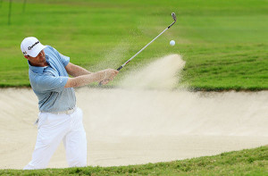 Blasting out of the bunker during this year's Sony Open in Honolulu