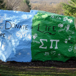 Fraternity brothers add their personal touch to a universal message.