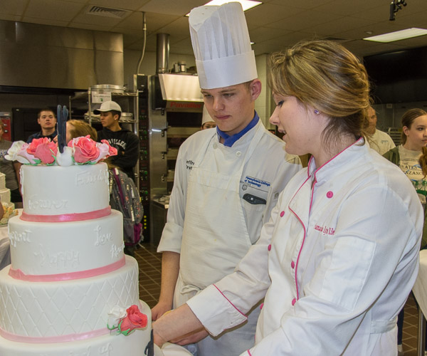 Contest judge Samantha Gundlach offers feedback to student Jeffrey L. Bretz, of Quakertown.