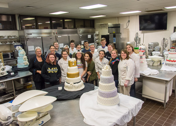 At the contest’s conclusion, students and judges gather among their handiwork.