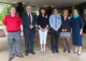 President Davie Jane Gilmour (right) joins 25-year employees (from left) Eric K. Albert, Tom F. Gregory, Jane E. Oehme, Thomas F. Speicher and Lisa M. Dincher.