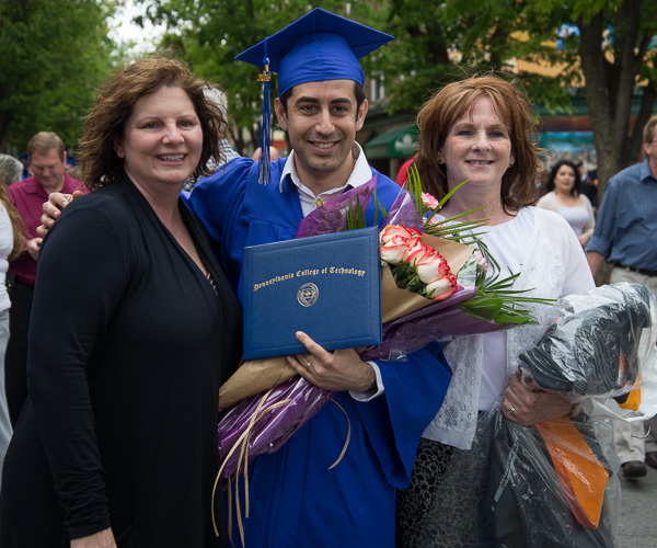 Shahryar Vahabzadeh, a nursing graduate originally from Iran, celebrates with two of his mentors, Margaret M. Faust (left) and Kathleen M. Hyatt, assistant professors of nursing.