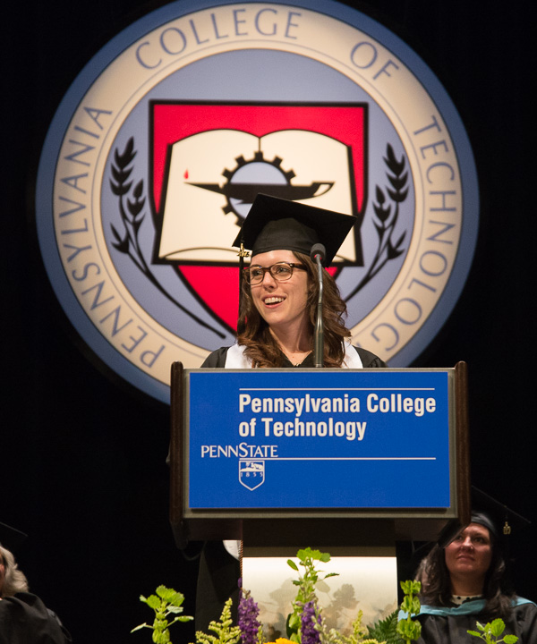 Wiegand delivers a lively talk, encouraging graduates to follow their passions and be of service to the world. In addition to speaker's honors, she was presented with the Business Faculty Award the night before.