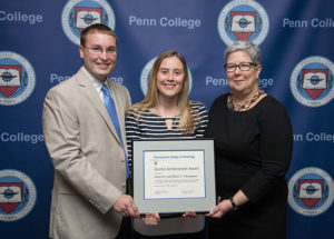 Alumni Achievement Award winners Adam D. and Hilary C. Thompson, of Leland, N.C., with Penn College President Davie Jane Gilmour. Adam’s hometown is Mill Hall and Hilary is originally from Strasburg.