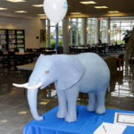 ... including a papier-mache elephant (and two winged pigs elsewhere up for sale) crafted by Dennis R. Dorward, associate professor of construction management/building construction ...