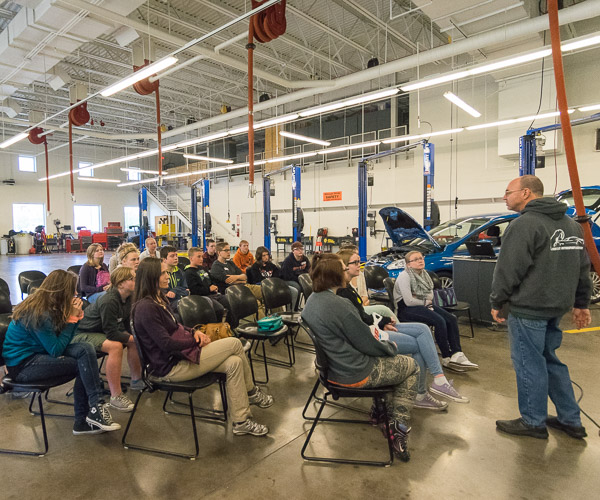Assistant automotive professor Christopher H. Van Stavoren leads a discussion of hybrid vehicles and the mandatory fuel-efficiency standards that take effect in 2025.