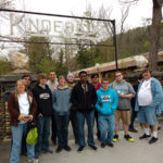 Associate professors Sandra Gorka and Daniel W. Yoas (left), as well as Jacob R. Miller (right), accompany students from the IT Living-Learning Community for a day of fun at Knoebels.