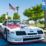 The beautiful Penn College provides a stunning backdrop for AACA festivities ... and the display of this racing veteran.