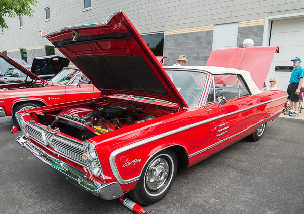 A 1966 Plymouth Sport Fury, in eye-catching red, displayed by Frank Draskovic, of West Middlesex.