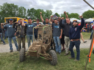 Members of the Penn College Baja SAE team celebrate after finishing fifth in the endurance race and 11th overall out of 98 teams at Baja SAE Rochester. From left are John G. Upcraft, team adviser; Nathan M. Eckstein, of Cambridge Springs; Clinton R. Bettner, of Beaver Falls; Tanner A. Huff, of Altoona; Logan B. Goodhart, of Chambersburg; Shane A. Linderman, of Leesport; Johnathan T. Capps, of North Wales; Shujaa AlQahtani, of State College; Jason B. Miller, of Mount Joy; and Ryan M. MacFarland, of Revere.