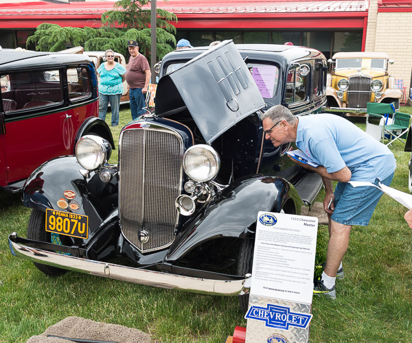 A judge gets a closer look at the 1933 Chevrolet CA Master of Roger C. Rittenhouse, of Smock.