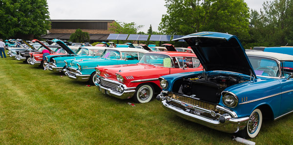 A phalanx of Chevys angles across the PDC lawn.