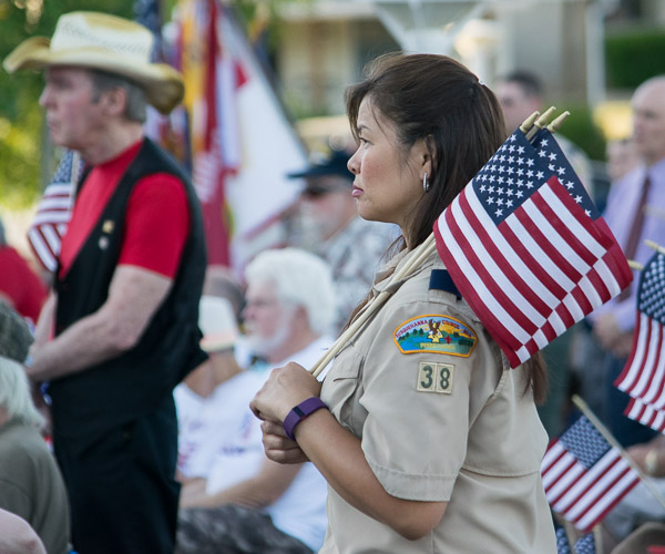 A Scout leader shoulders her love of country.
